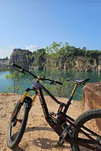 bike in front of an old quary lake